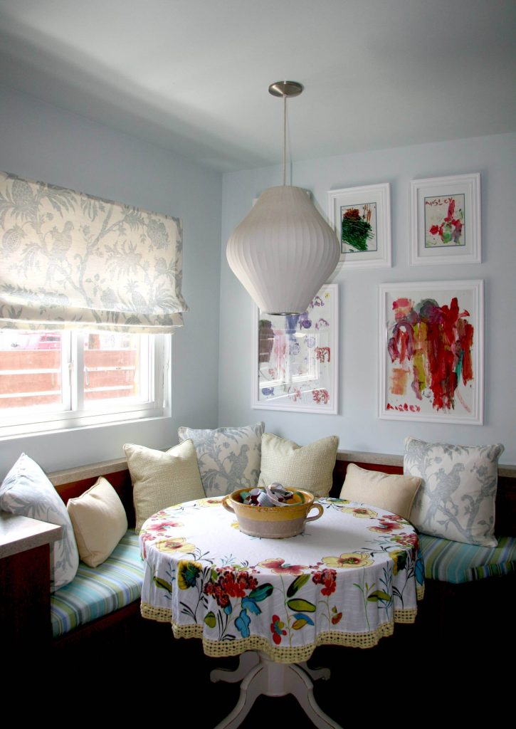 An existing banquette was dressed up by Knapp Interiors for this eclectic Los Angeles kitchen