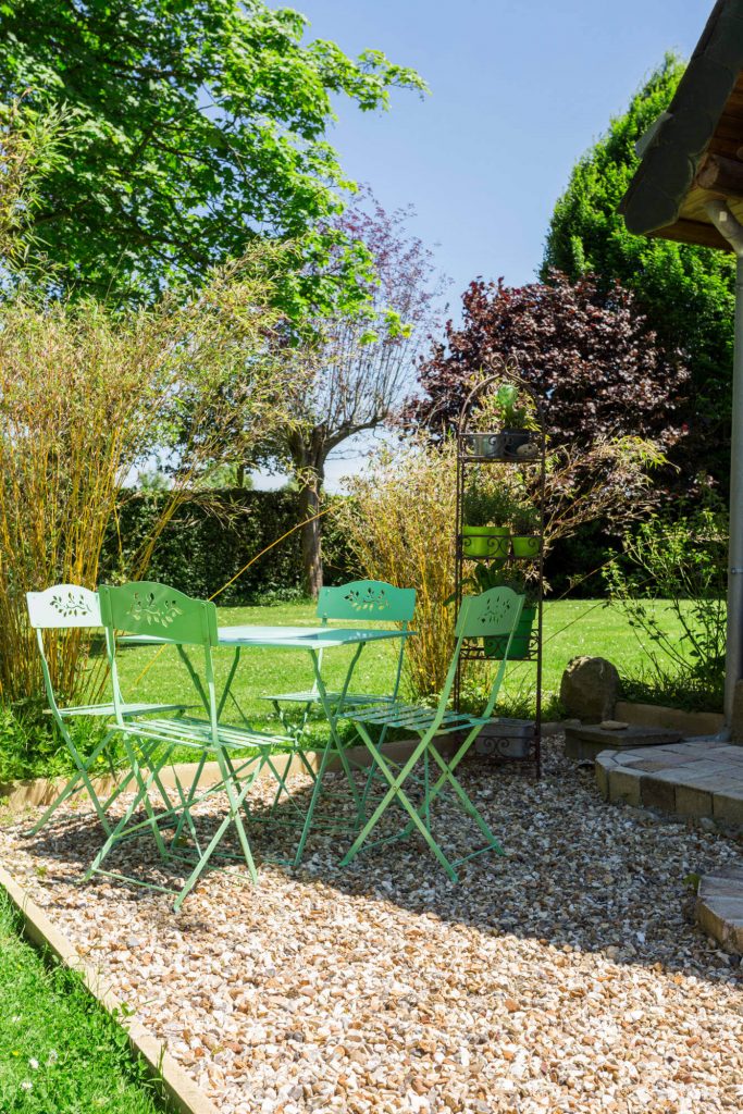 Inspiration for a country backyard gravel patio remodel in Paris with no cover.