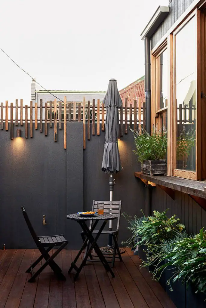 Inspiration for a small contemporary courtyard deck container garden remodel in Sydney with no cover