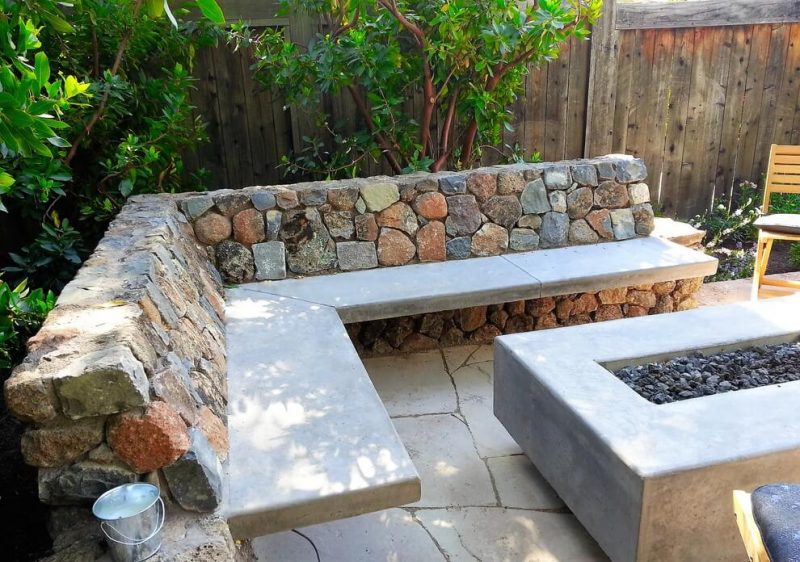 Inspiration for a small craftsman backyard stone patio remodel in San Francisco with a fire pit and no cover