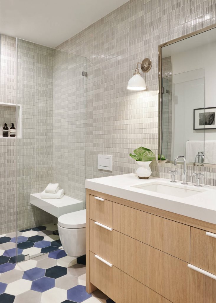 Large transitional kids ceramic tile and gray tile cement tile floor and blue floor walk in shower photo in San Francisco with flat panel cabinets