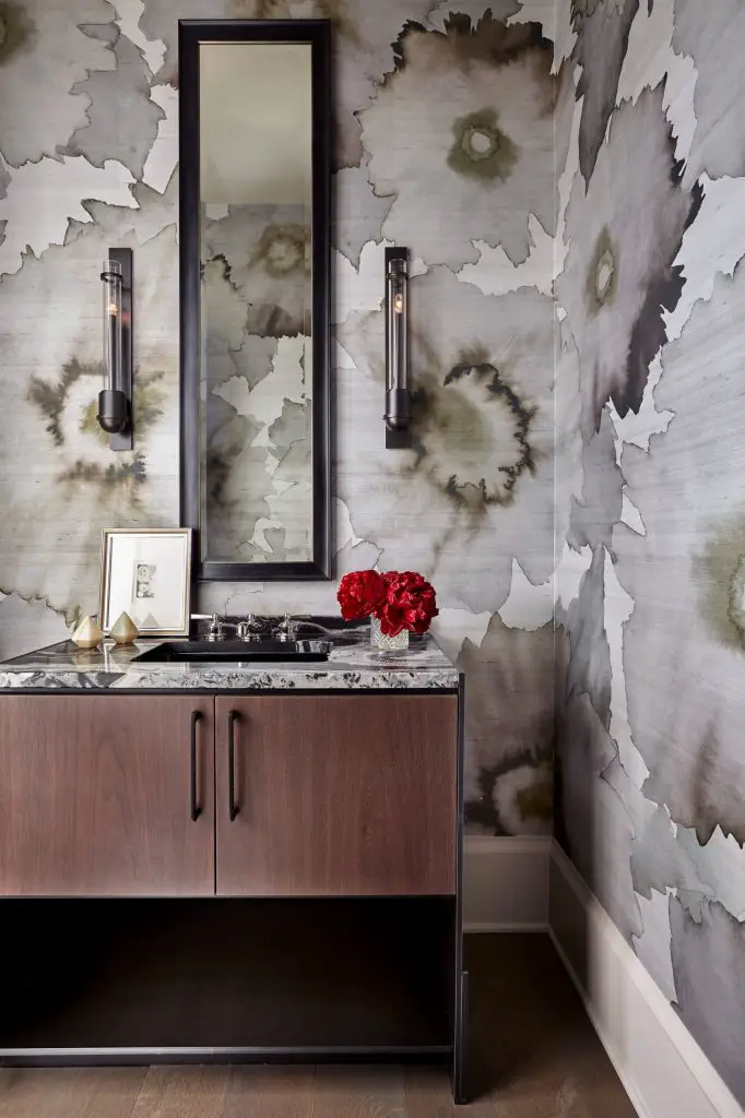 Beautiful abstract floral-patterned wallpaper softens the rectangular elements in this sophisticated contemporary powder room by Joel Kelly Design.