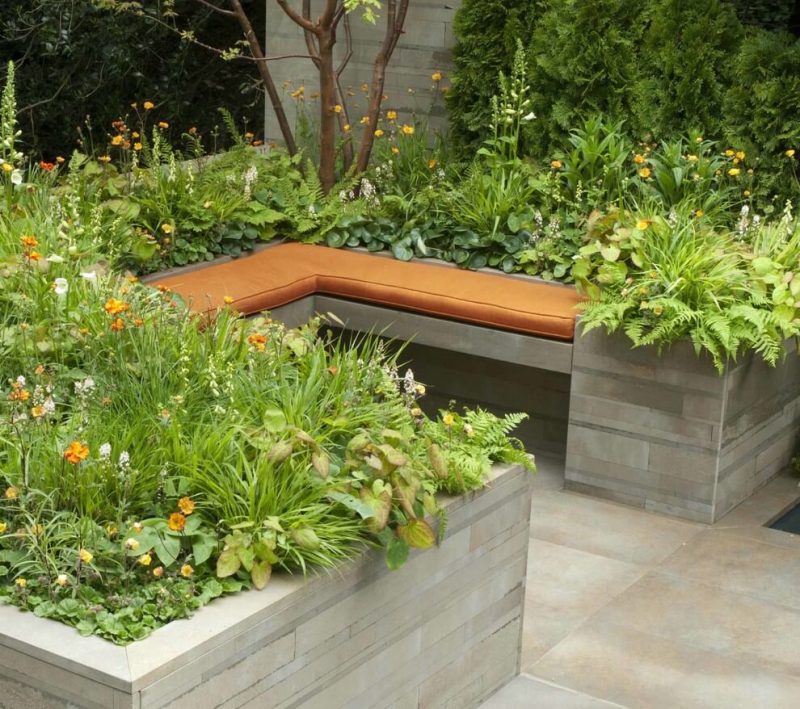 Sleek recycled sandstone by artisan Italian stonemasons gives a contemporary feel to the concept of an artisan garden