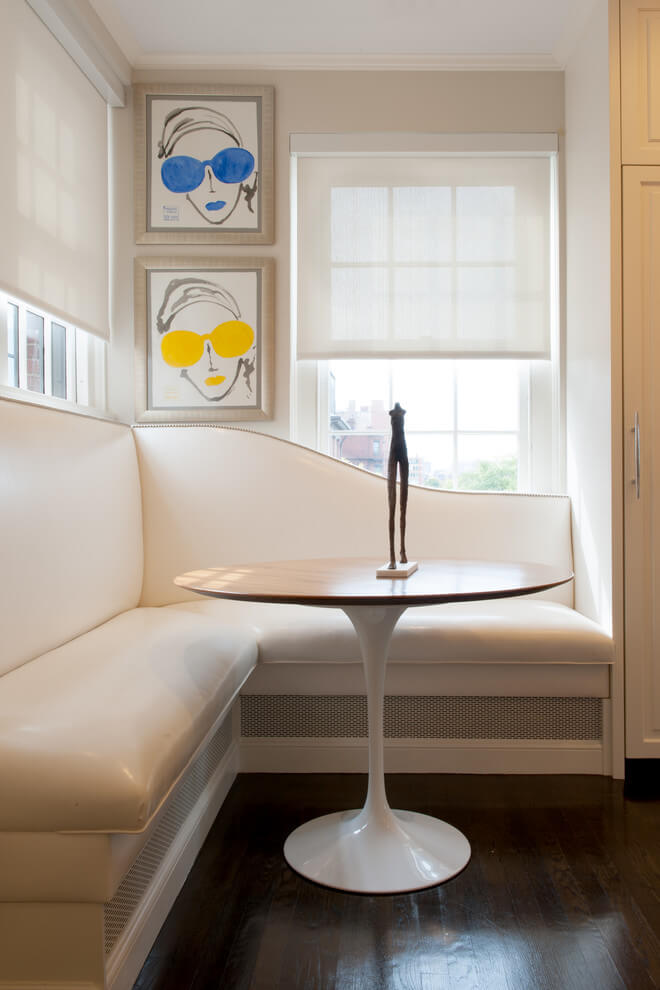 The smooth curves of this custom banquette make an elegant statement in this New York City kitchen