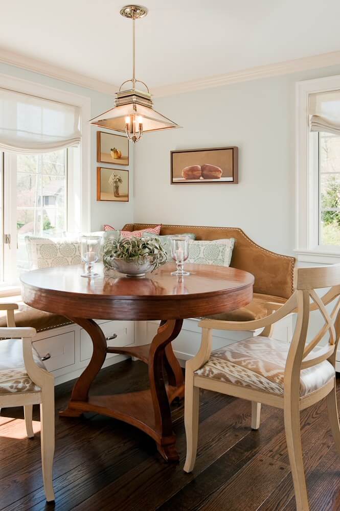 This Boston breakfast nook, designed by Su Casa Designs, includes a custom leather banquette with chrome nailheads