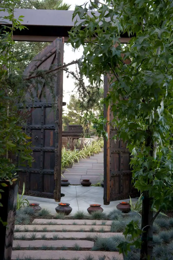 A complete garden renovation with Asian influenced designs, such as this garden gate