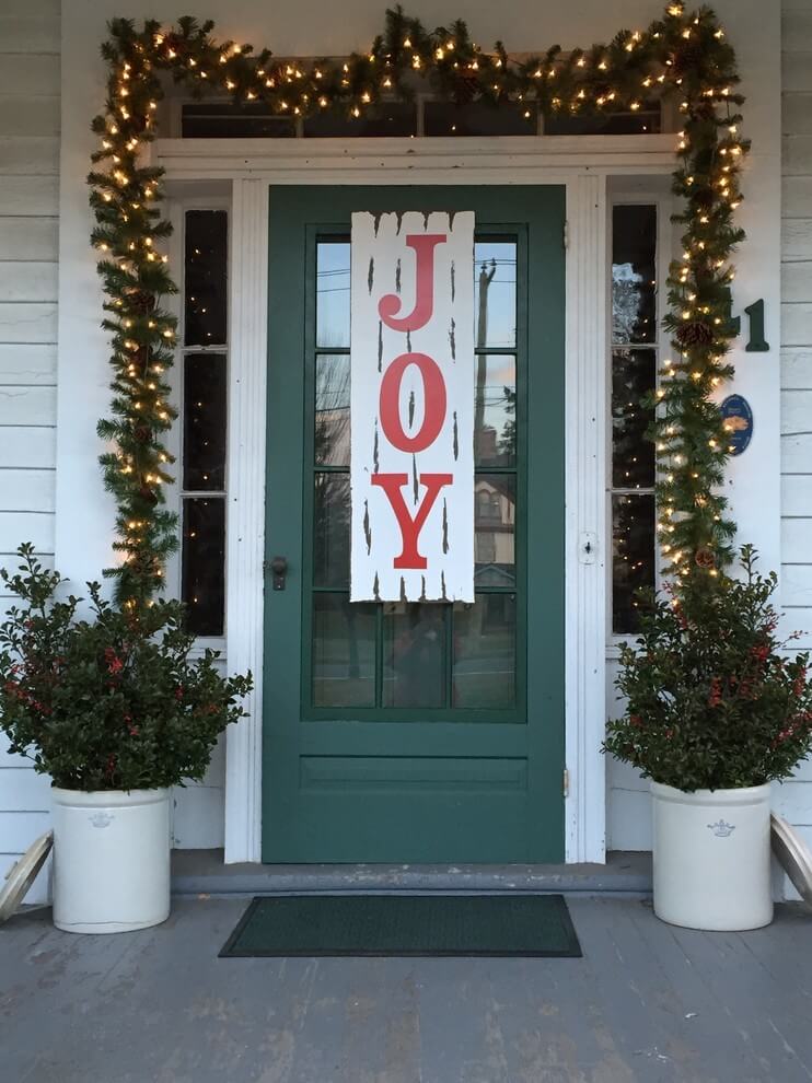 A spirited message marks this door, spreading the joy to all who approach.