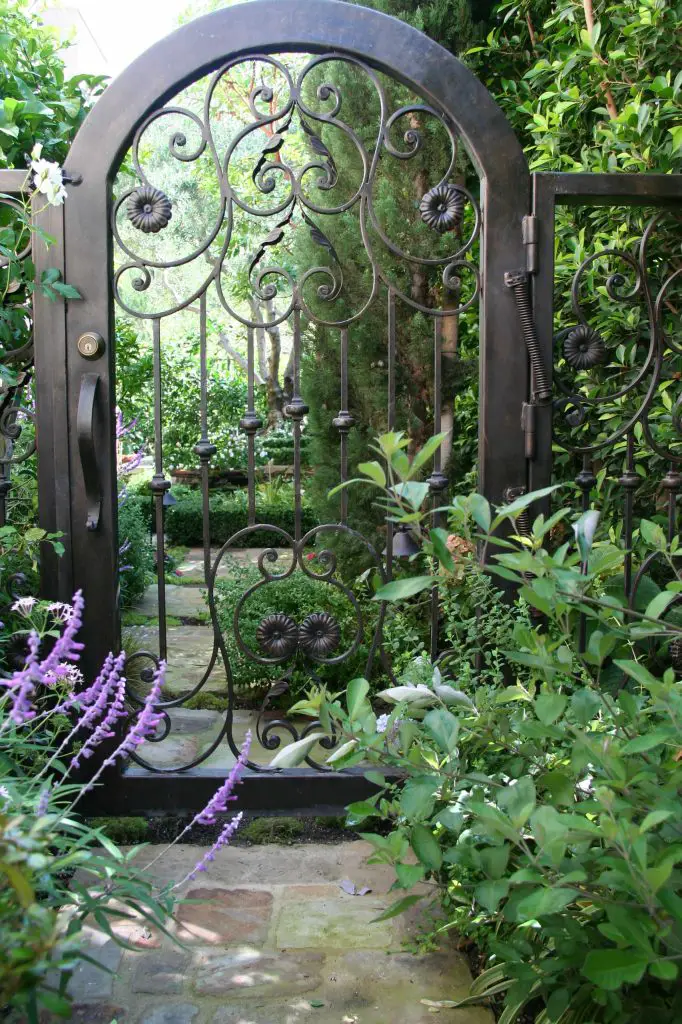 Mirage Landscape custom designed this Los Angeles garden gate and had it hand forged in iron.