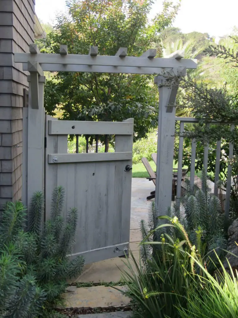 Pedersen Associates used western red cedar with a gray stain for this garden gate.