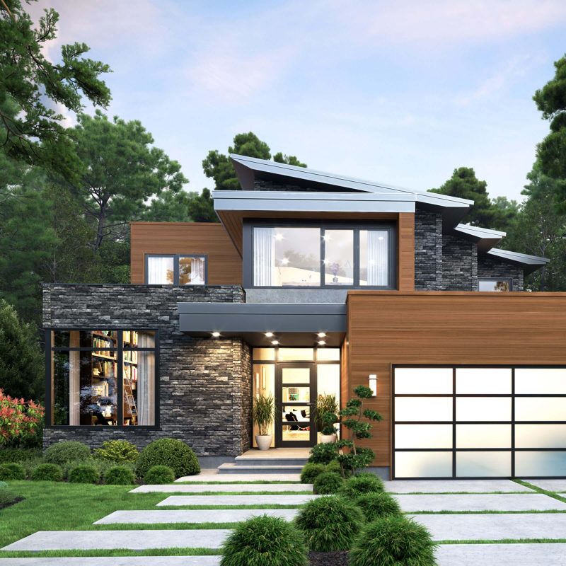 Playful grasses and hedges shaped into mounds line the entry walkway and front yard of this home in Toronto