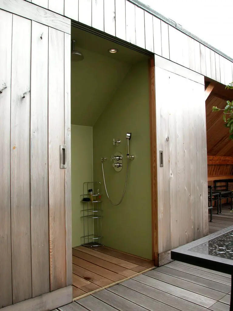 Semioutdoor shower in Paris features two large sliding doors