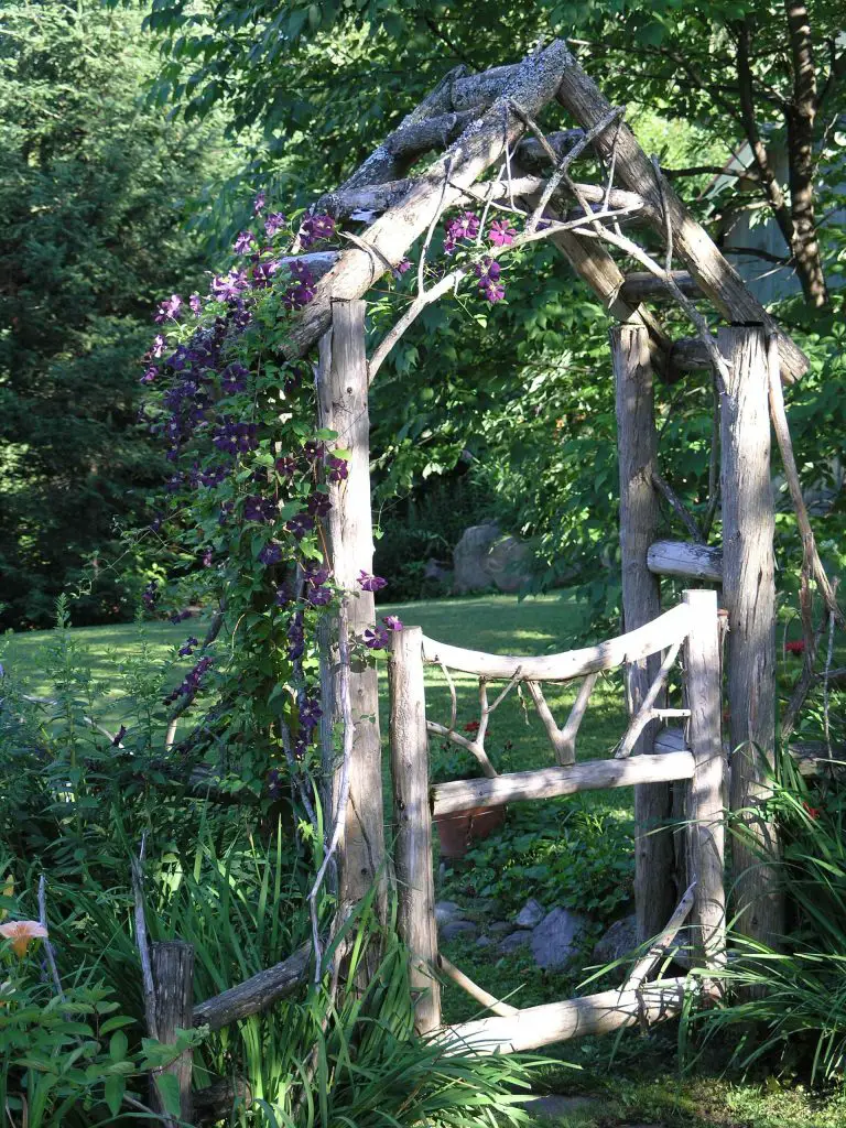 This Adirondack inspired garden gate was created by artist Charles Atwood King, who is known for his intricate outdoor structures.