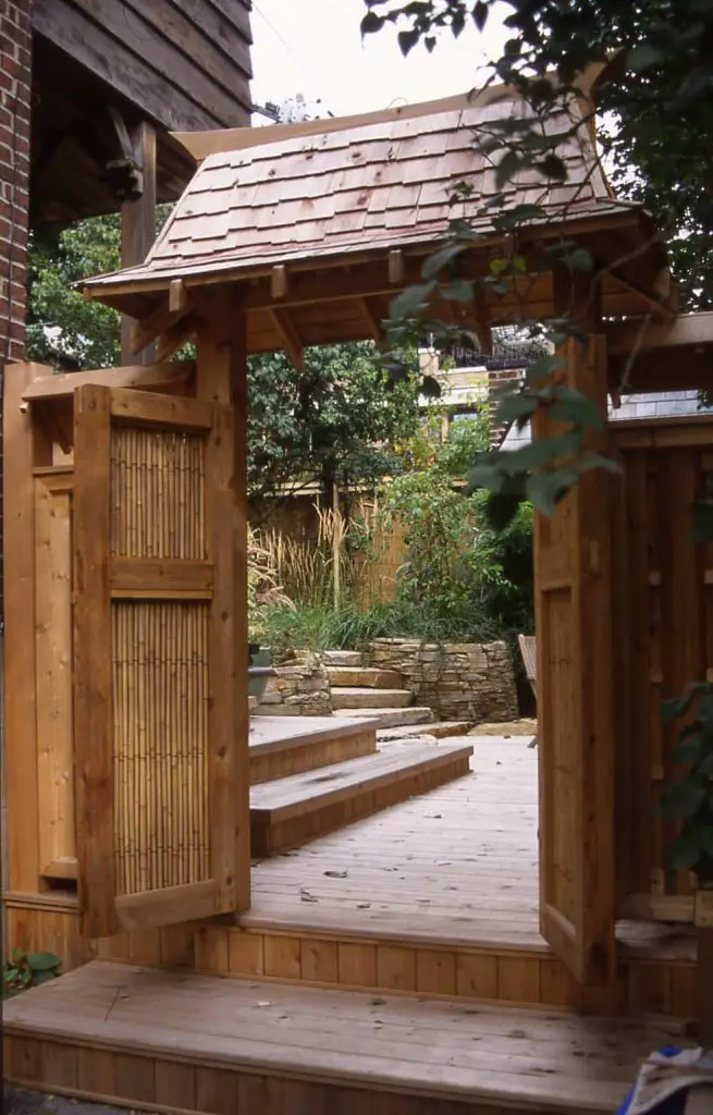 This Asian inspired garden includes a custom garden gate made from bamboo