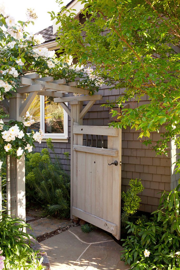 This garden gate in San Anselmo, California, is made from western red cedar and stained in Beachwood Grey stain by Cabot.