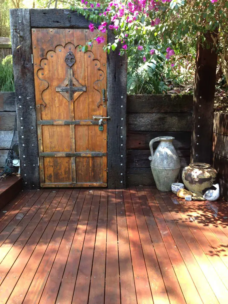 This handmade door created by Melbourne Decking for an Australian garden was inspired