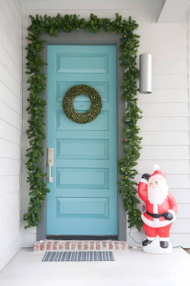 This happy Santa greets all who enter.