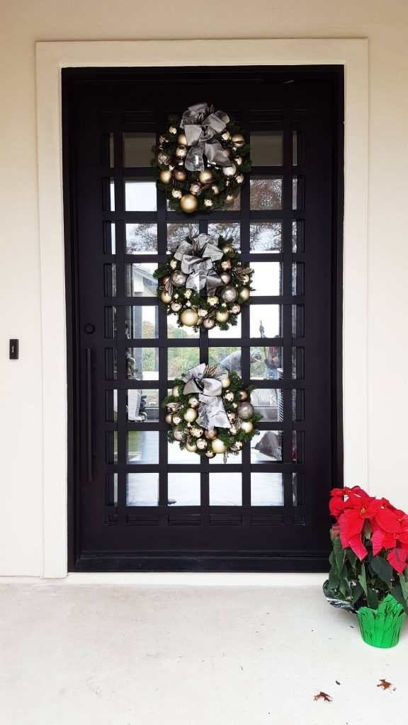 This large door is doing triple duty for the holidays.