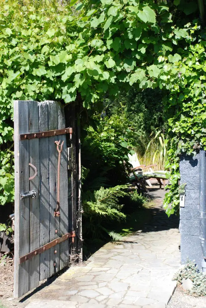 This lovely gate in New Zealand was made from the back of an old dray, or cart, found on the property more than 40 years ago.