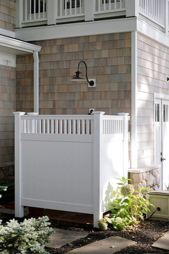 White outdoor shower enclosure in Michigan